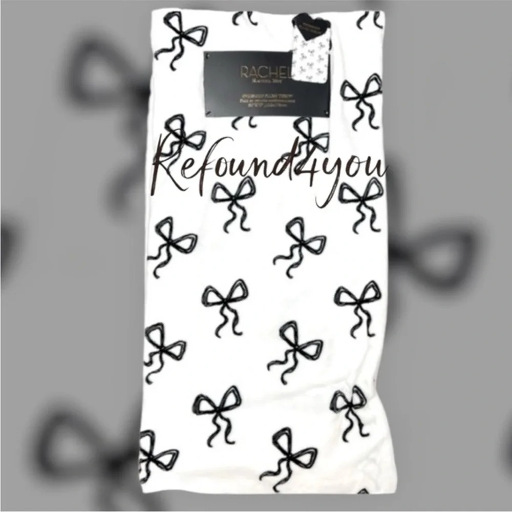 Rachel Roy - ‘Bows - Black’ plush throw. 60” x 70“. NWT.